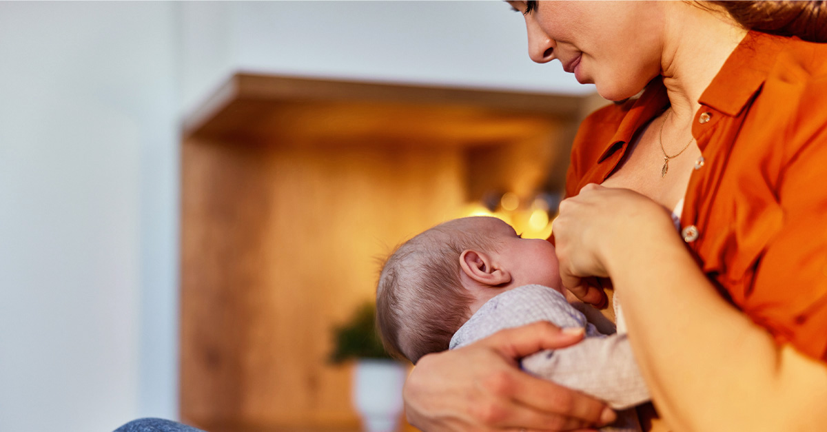 A mom breastfeeding her newborn.